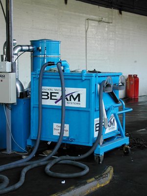 Beam industrial Vacuum and bulk separator plugged in at valeting bay